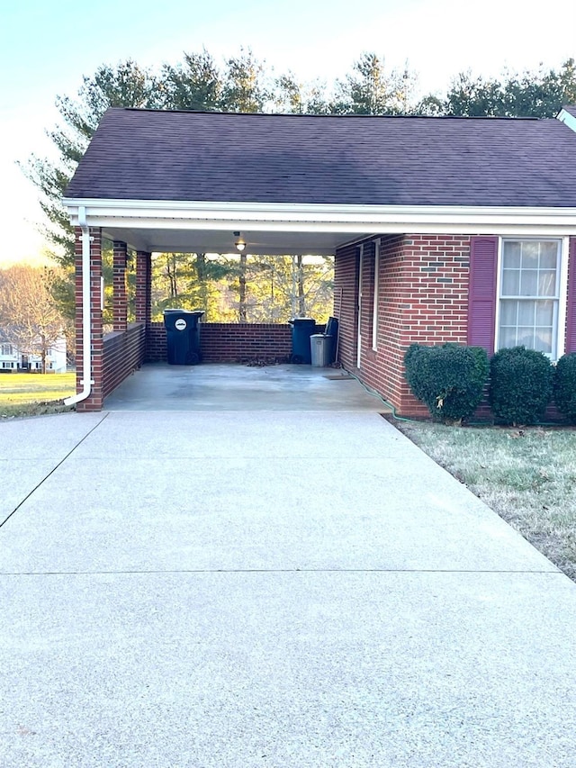 1102 Smith St, Bedford, VA 24523 - view of parking / parking lot with concrete driveway and a carport