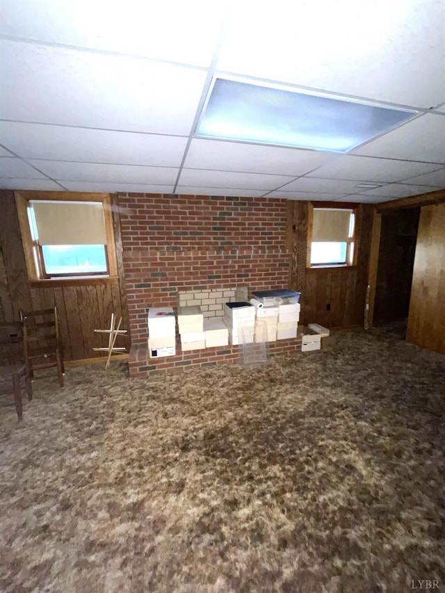 1102 Smith St, Bedford, VA 24523 - basement featuring a paneled ceiling, wood walls, and carpet flooring