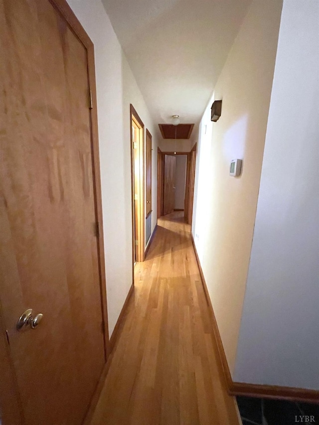 1102 Smith St, Bedford, VA 24523 - hallway featuring light wood finished floors and attic access