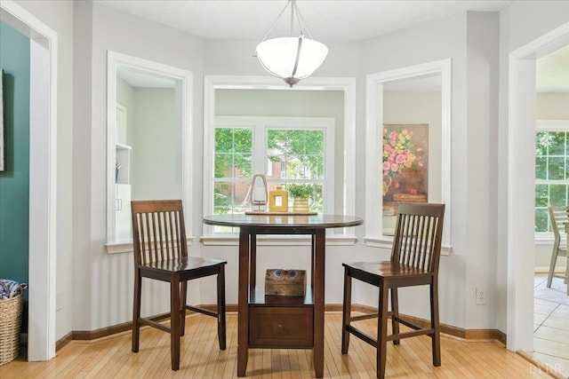 702 Kings Rd, Lynchburg, VA 24502 - dining space featuring hardwood / wood-style flooring and baseboards