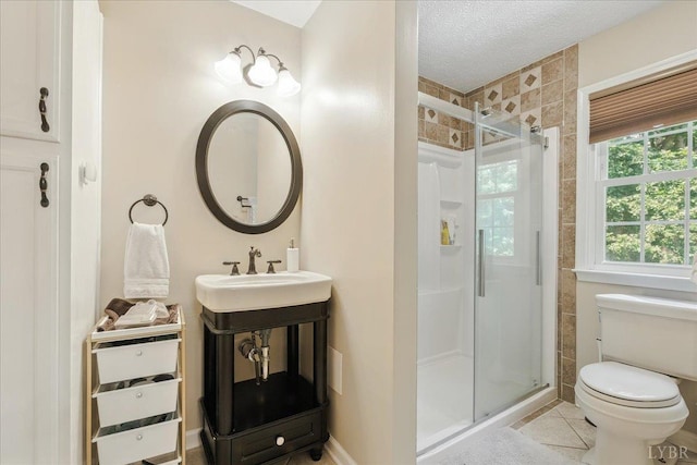 702 Kings Rd, Lynchburg, VA 24502 - bathroom with a shower stall, vanity, tile patterned flooring, and a textured ceiling