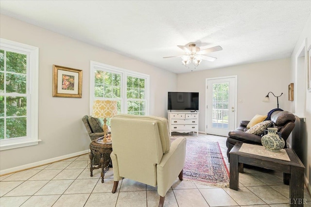 702 Kings Rd, Lynchburg, VA 24502 - living room featuring a ceiling fan and light tile patterned floors
