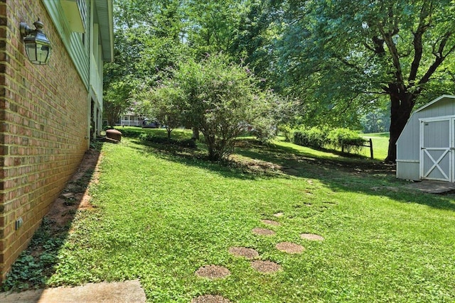702 Kings Rd, Lynchburg, VA 24502 - view of green lawn with a storage shed and view of scattered trees