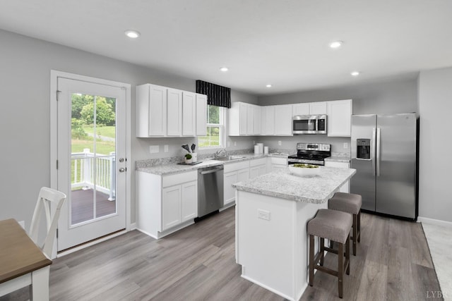 50 Levi Ln, Lynchburg, VA 24502 - kitchen with stainless steel appliances, healthy amount of natural light, a kitchen bar, a center island, and recessed lighting