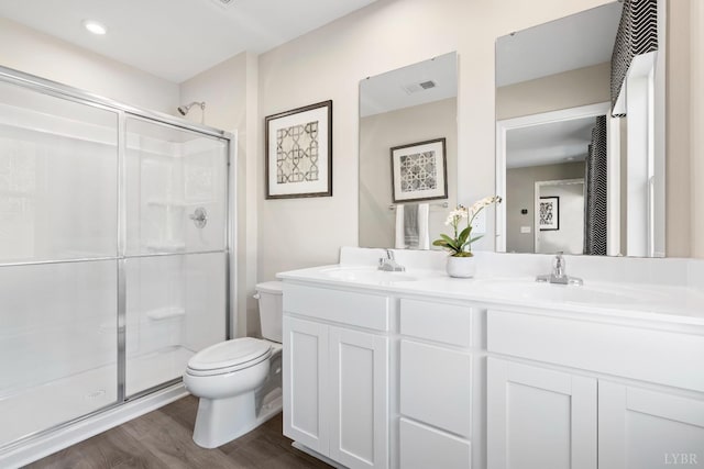 50 Levi Ln, Lynchburg, VA 24502 - bathroom with double vanity, a shower stall, and wood finished floors