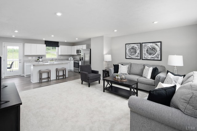 50 Levi Ln, Lynchburg, VA 24502 - living room featuring recessed lighting, light carpet, and light wood finished floors