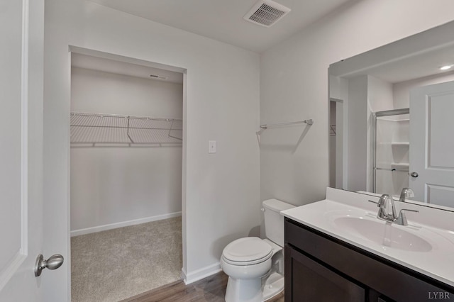 45 Levi Ln, Lynchburg, VA 24502 - bathroom with a spacious closet, vanity, wood finished floors, and a shower