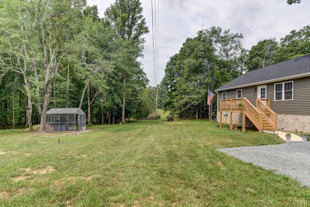 199 Dunivan Dr, Rustburg, VA 24588 - view of green lawn featuring stairway and a wooden deck