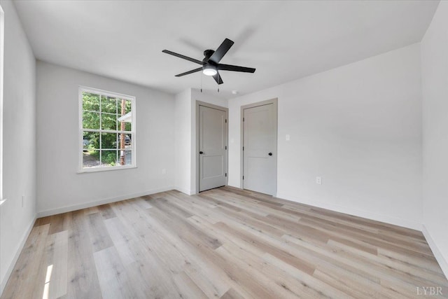 614 7th St, Lynchburg, VA 24504 - empty room featuring light wood finished floors and a ceiling fan