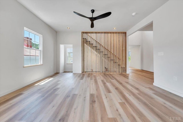 614 7th St, Lynchburg, VA 24504 - unfurnished living room with a ceiling fan, light wood-style floors, and recessed lighting