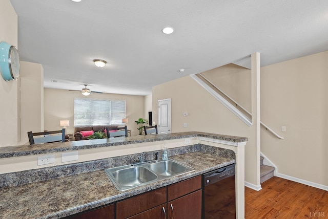 1600 Wards Fry Unit 506, Lynchburg, VA 24502 - kitchen featuring dishwasher, light wood-style floors, open floor plan, dark countertops, and ceiling fan