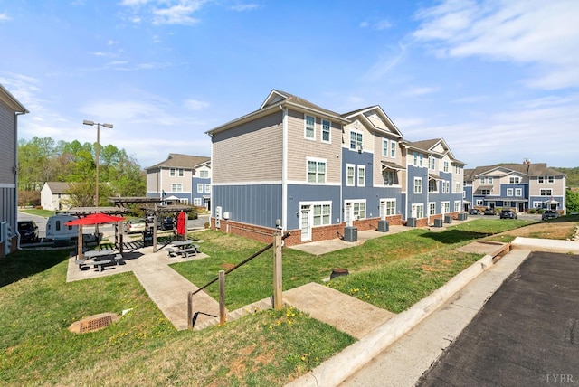 1600 Wards Fry Unit 506, Lynchburg, VA 24502 - view of home's exterior featuring a residential view, a yard, and a patio area
