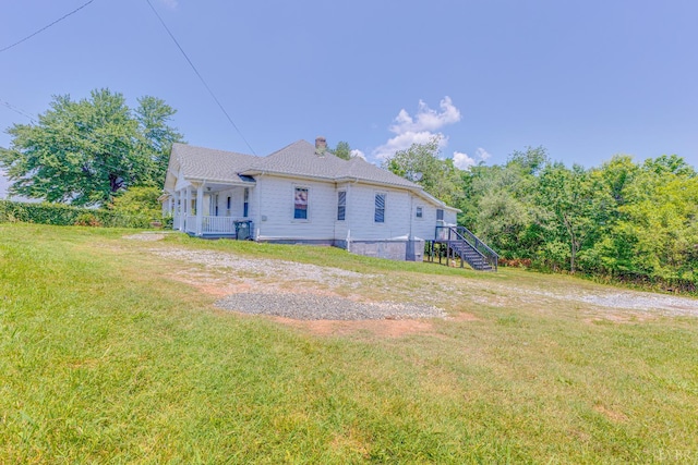 3150 Campbell Ave, Lynchburg, VA 24501 - back of property with a chimney, a lawn, and stairs