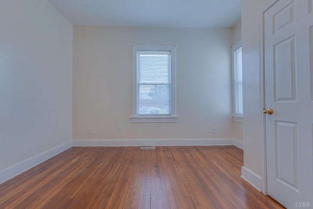 3150 Campbell Ave, Lynchburg, VA 24501 - spare room featuring dark wood finished floors and baseboards