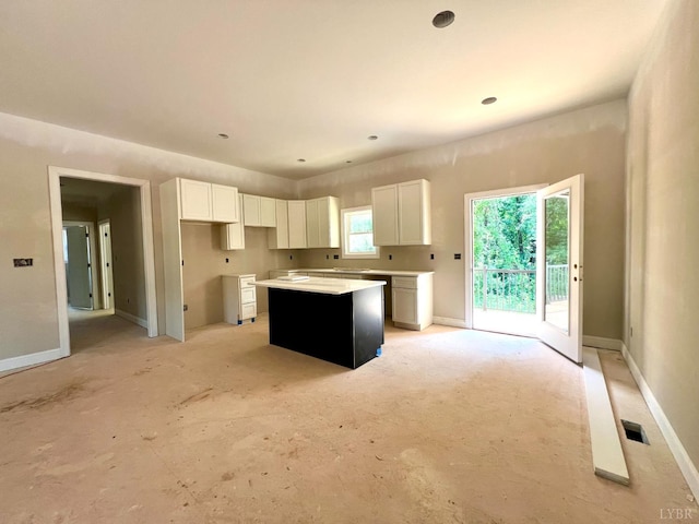 0 Graham Creek Rd, Madison Heights, VA 24572 - kitchen with a kitchen island and white cabinetry