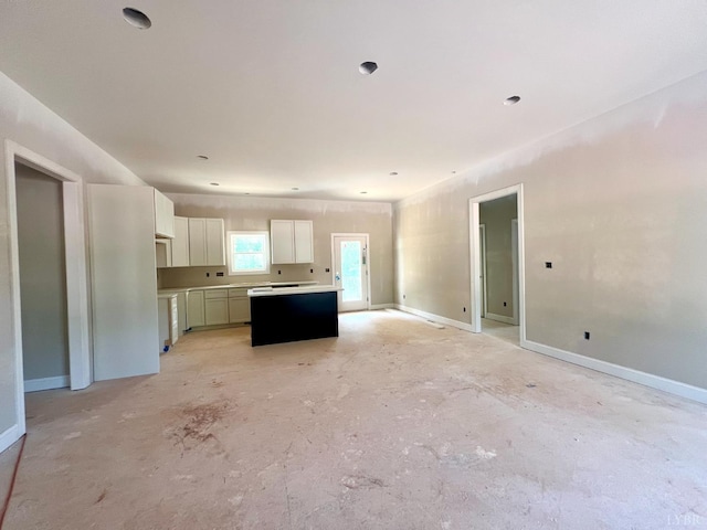 0 Graham Creek Rd, Madison Heights, VA 24572 - kitchen featuring a center island, open floor plan, and white cabinetry