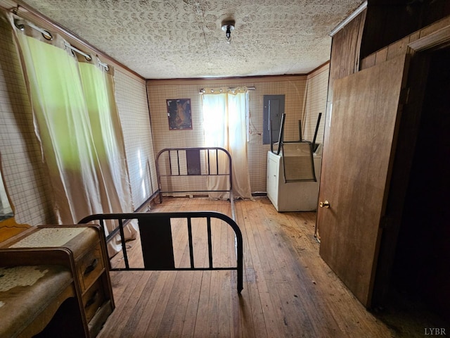 518 N Fork Rd, Amherst, VA 24521 - bedroom with hardwood / wood-style floors, electric panel, and ornamental molding