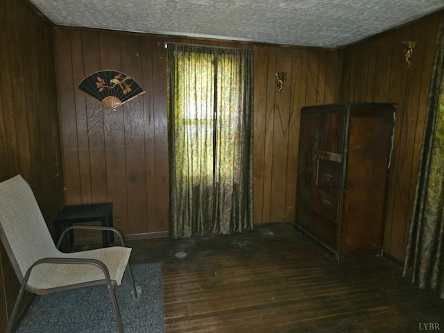 518 N Fork Rd, Amherst, VA 24521 - living area featuring hardwood / wood-style flooring, wooden walls, and a textured ceiling