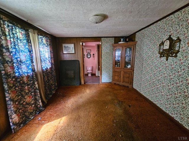 518 N Fork Rd, Amherst, VA 24521 - unfurnished living room with wallpapered walls and a textured ceiling