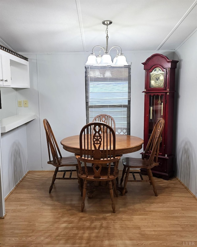 271 Candlemakers Ln, Rustburg, VA 24588 - dining area with light wood-style flooring and a chandelier