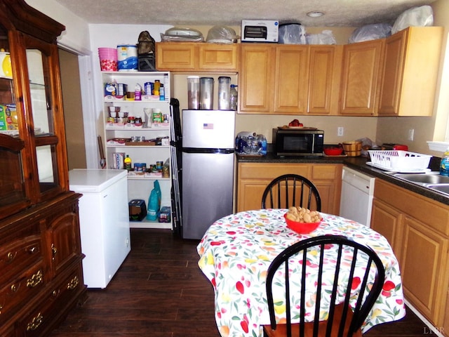 205 Tyree Cir, Madison Heights, VA 24572 - kitchen featuring freestanding refrigerator, dark wood-style floors, dishwasher, fridge, and dark countertops