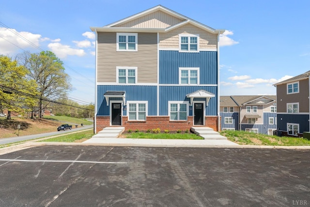 1600 Wards Fry Unit 1302, Lynchburg, VA 24502 - view of property featuring brick siding and uncovered parking