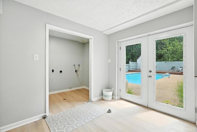 2824 Hawkins Mill Rd, Lynchburg, VA 24502 - entryway featuring french doors, wood finished floors, and a textured ceiling