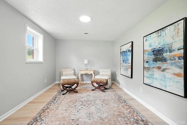 2824 Hawkins Mill Rd, Lynchburg, VA 24502 - sitting room featuring light wood-type flooring and a textured ceiling