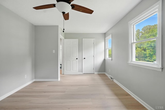 2824 Hawkins Mill Rd, Lynchburg, VA 24502 - unfurnished bedroom with light wood-style flooring and a ceiling fan