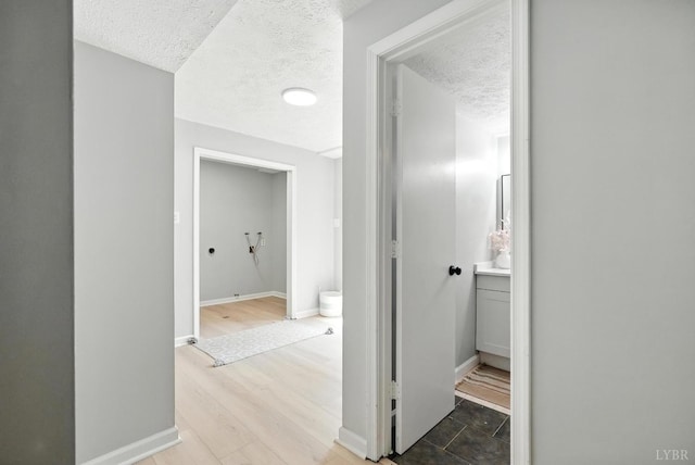 2824 Hawkins Mill Rd, Lynchburg, VA 24502 - hall featuring a textured ceiling and wood finished floors