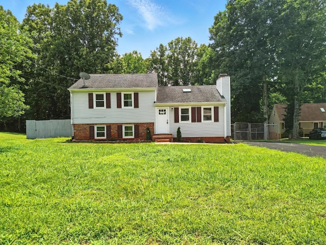 2824 Hawkins Mill Rd, Lynchburg, VA 24502 - tri-level home with a chimney and roof with shingles