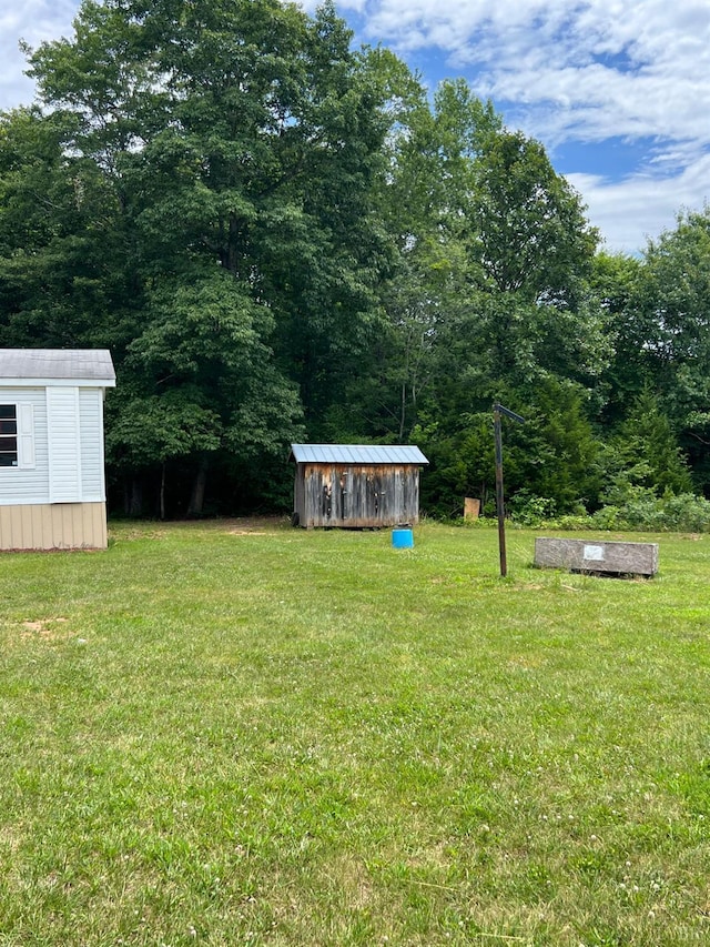 12440 E Gretna Rd, Gretna, VA 24557 - view of green lawn with a shed