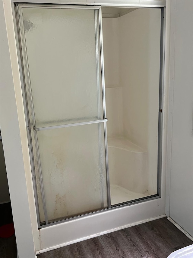 12440 E Gretna Rd, Gretna, VA 24557 - bathroom featuring a shower stall and wood finished floors