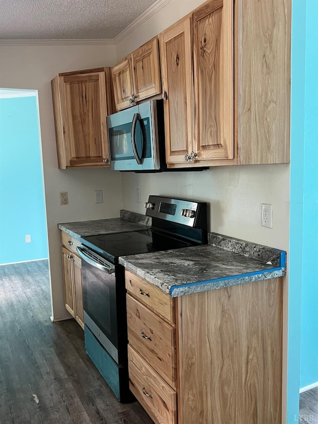 12440 E Gretna Rd, Gretna, VA 24557 - kitchen featuring appliances with stainless steel finishes, dark wood finished floors, ornamental molding, a textured ceiling, and dark countertops