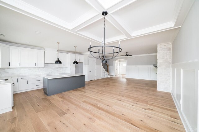 87 S Westyn Loop, Forest, VA 24551 - kitchen featuring coffered ceiling, a chandelier, backsplash, open floor plan, and light wood-style flooring