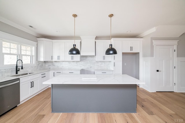 87 S Westyn Loop, Forest, VA 24551 - kitchen with stainless steel dishwasher, custom exhaust hood, crown molding, light stone counters, and backsplash