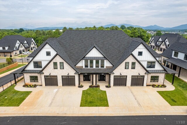 87 S Westyn Loop, Forest, VA 24551 - view of front of home featuring a garage, driveway, and a standing seam roof