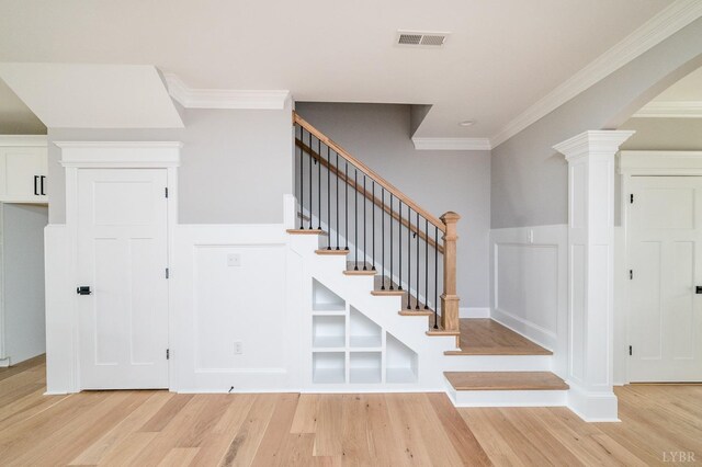 87 S Westyn Loop, Forest, VA 24551 - staircase with wood finished floors, ornamental molding, arched walkways, ornate columns, and a decorative wall