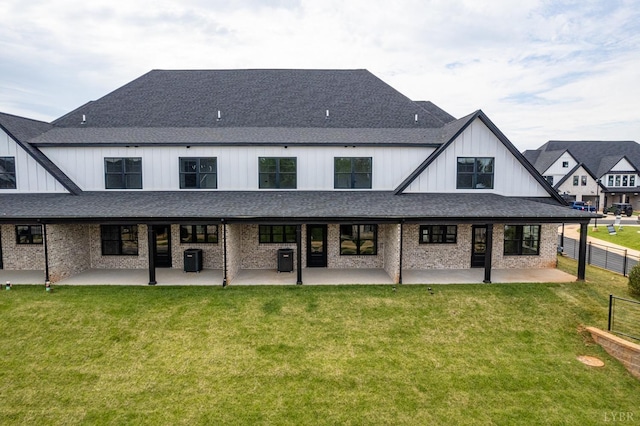 87 S Westyn Loop, Forest, VA 24551 - rear view of property featuring a patio, a shingled roof, and board and batten siding