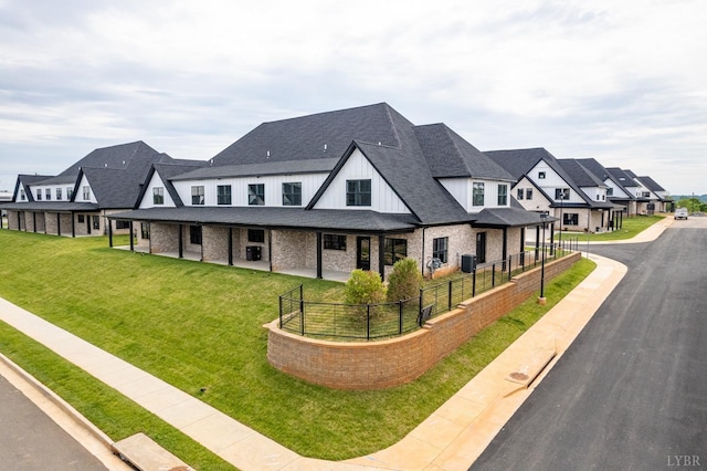87 S Westyn Loop, Forest, VA 24551 - view of front of home with board and batten siding, a shingled roof, brick siding, and a residential view