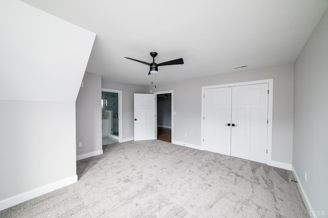 87 S Westyn Loop, Forest, VA 24551 - unfurnished bedroom featuring carpet floors, a closet, connected bathroom, and ceiling fan