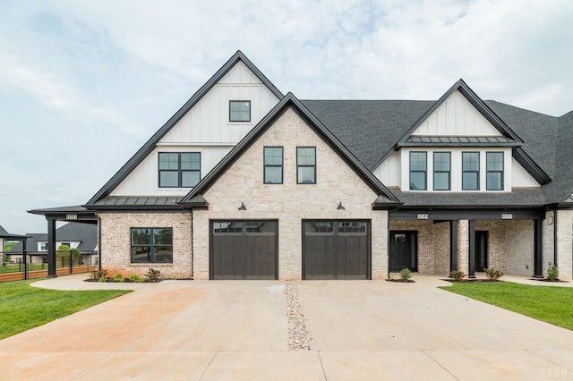 87 S Westyn Loop, Forest, VA 24551 - view of front of house featuring a standing seam roof, board and batten siding, driveway, and a garage