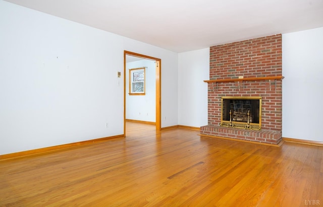 625 Sherman Dr, Lynchburg, VA 24502 - unfurnished living room featuring wood finished floors and a brick fireplace