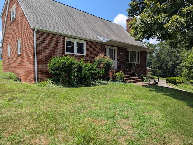 625 Sherman Dr, Lynchburg, VA 24502 - view of front facade featuring a chimney, brick siding, a shingled roof, and a front lawn