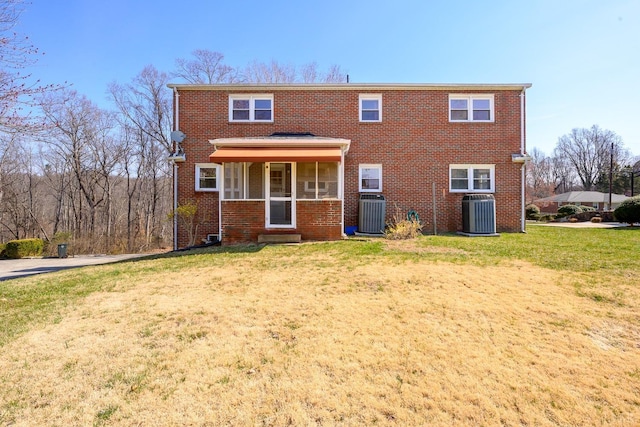 625 Sherman Dr, Lynchburg, VA 24502 - rear view of property featuring a yard and brick siding