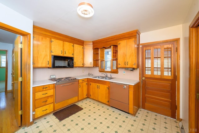 625 Sherman Dr, Lynchburg, VA 24502 - kitchen featuring appliances with stainless steel finishes, light countertops, light floors, and tasteful backsplash
