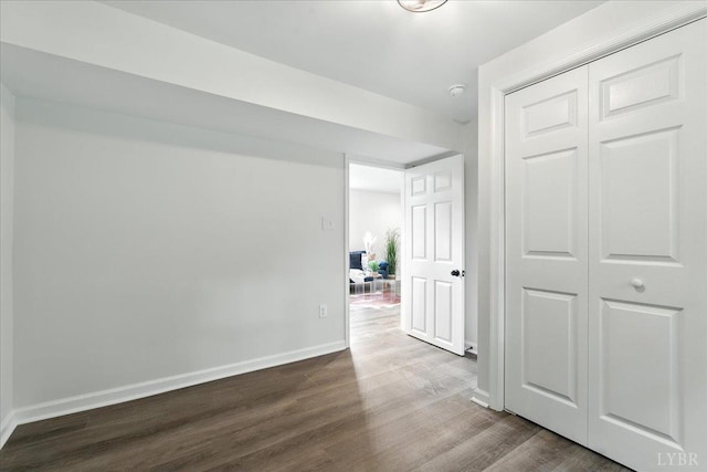 121 Brooke St, Brookneal, VA 24528 - hallway with dark wood-style floors and baseboards