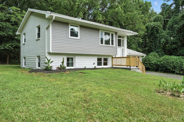 121 Brooke St, Brookneal, VA 24528 - rear view of property featuring a yard