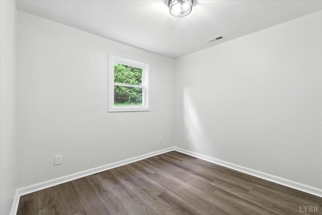 121 Brooke St, Brookneal, VA 24528 - empty room featuring dark wood-style floors and baseboards