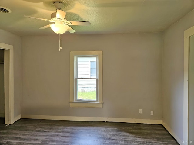 1275 Cedar Ave, Buena Vista, VA 24416 - unfurnished bedroom with dark wood-style floors and a ceiling fan